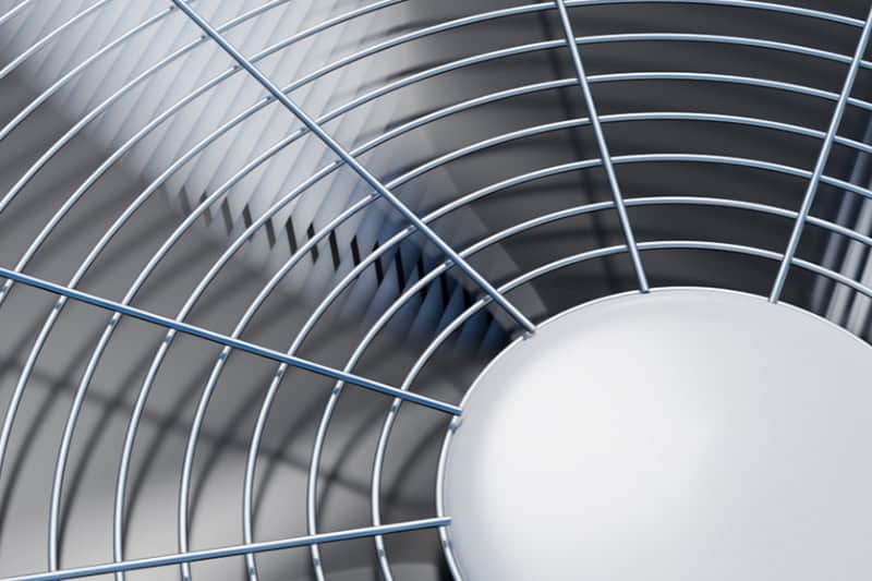 Air conditioning fan blades spinning.
